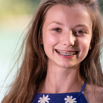 girl smiling with braces girl smiling with braces